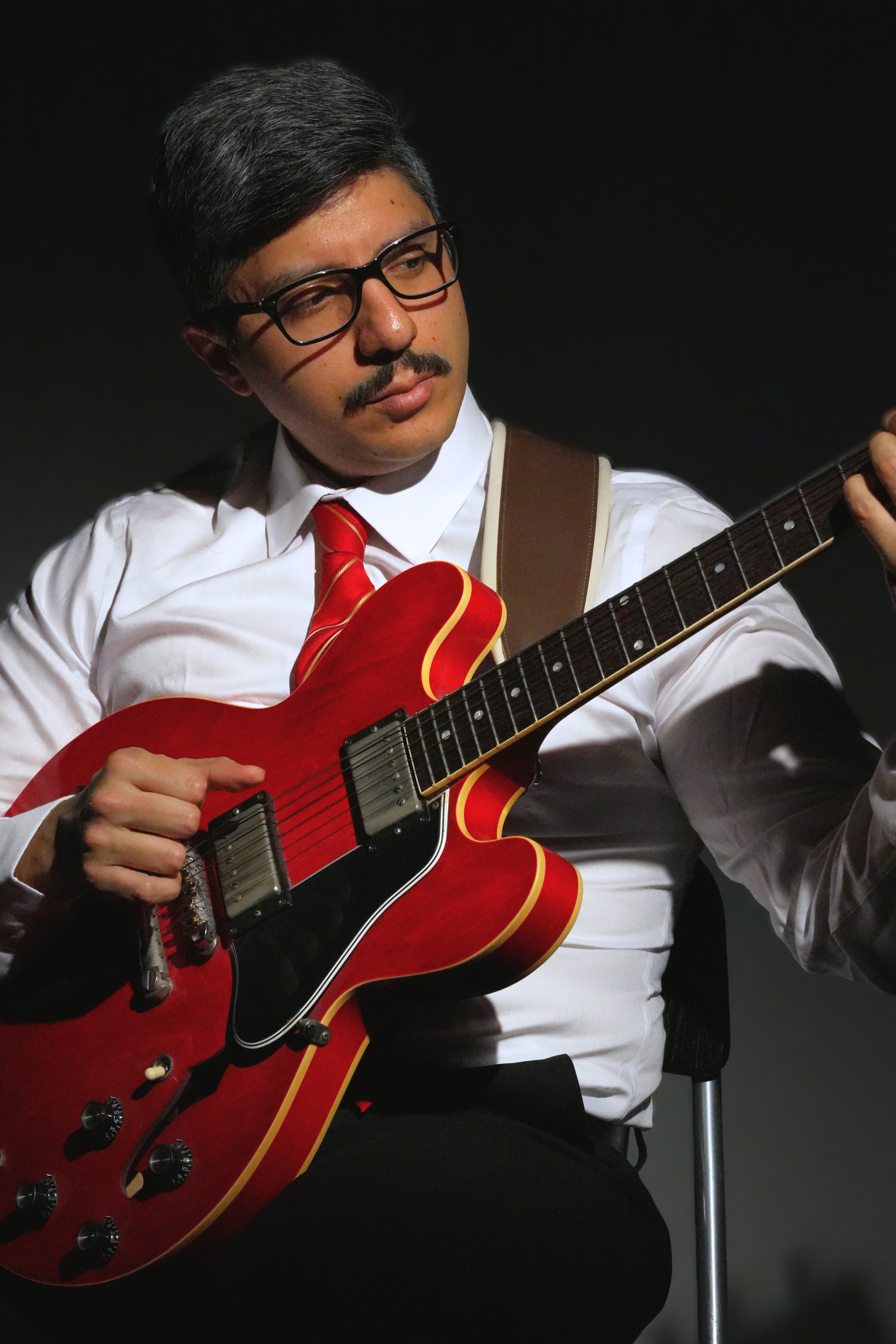 Gabriel playing guitar